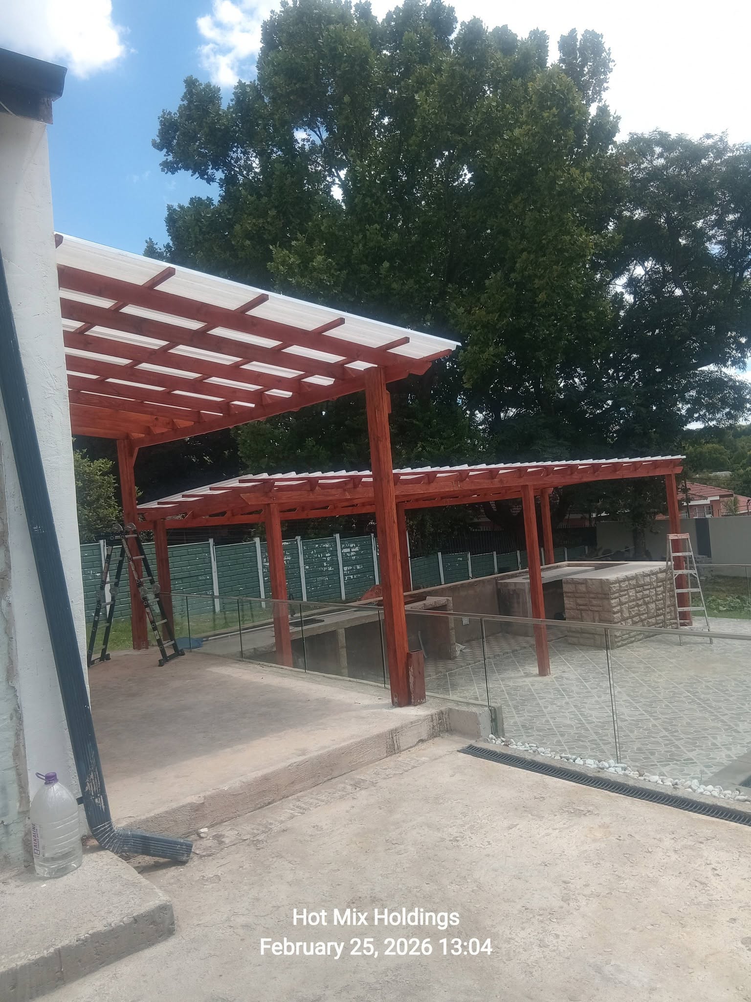 Pergola Shades project 4: During by Hot Mix Holdings